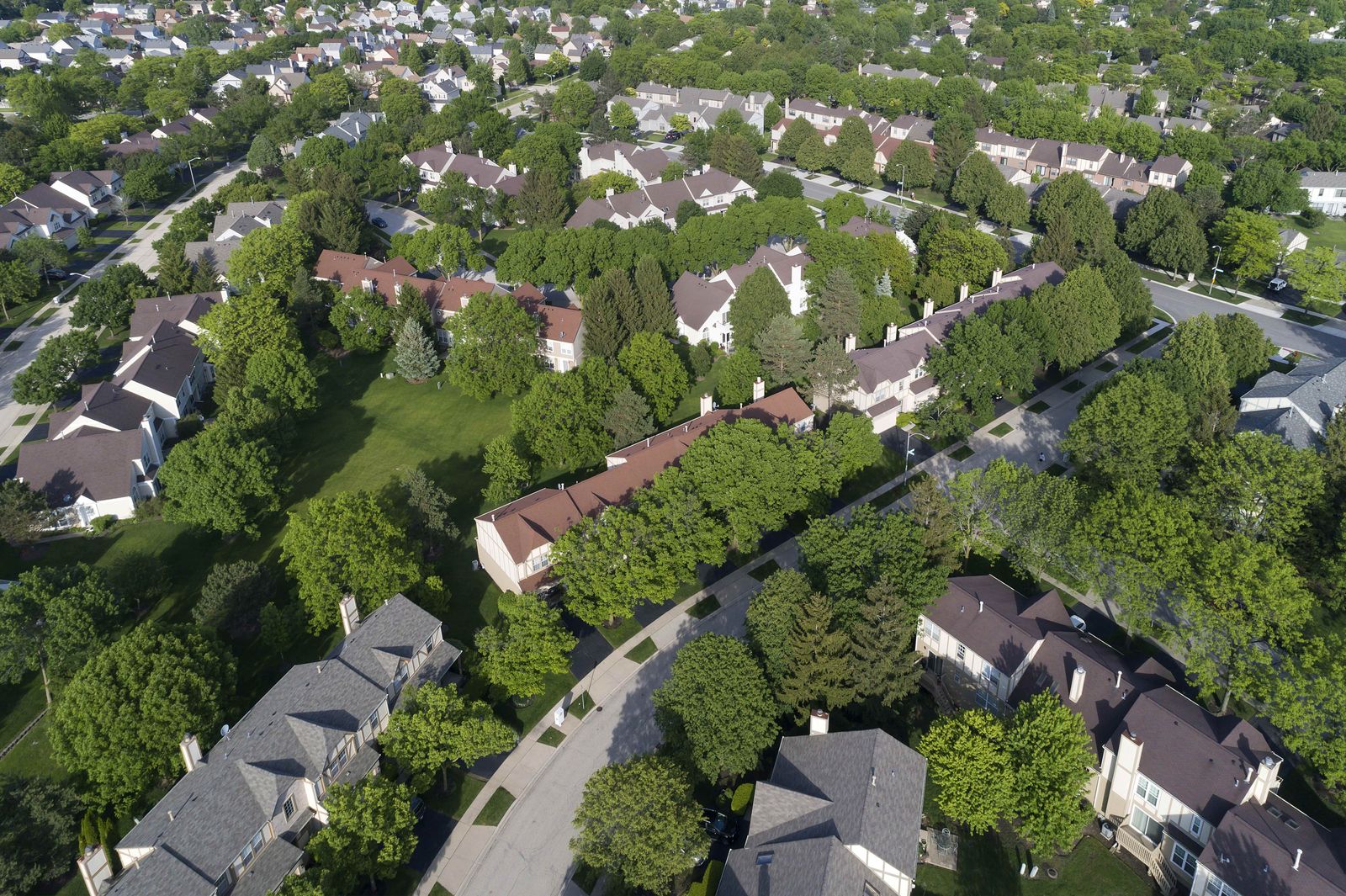 Aerial view of a suburban Chicagoland neighborhood after a summer storm season